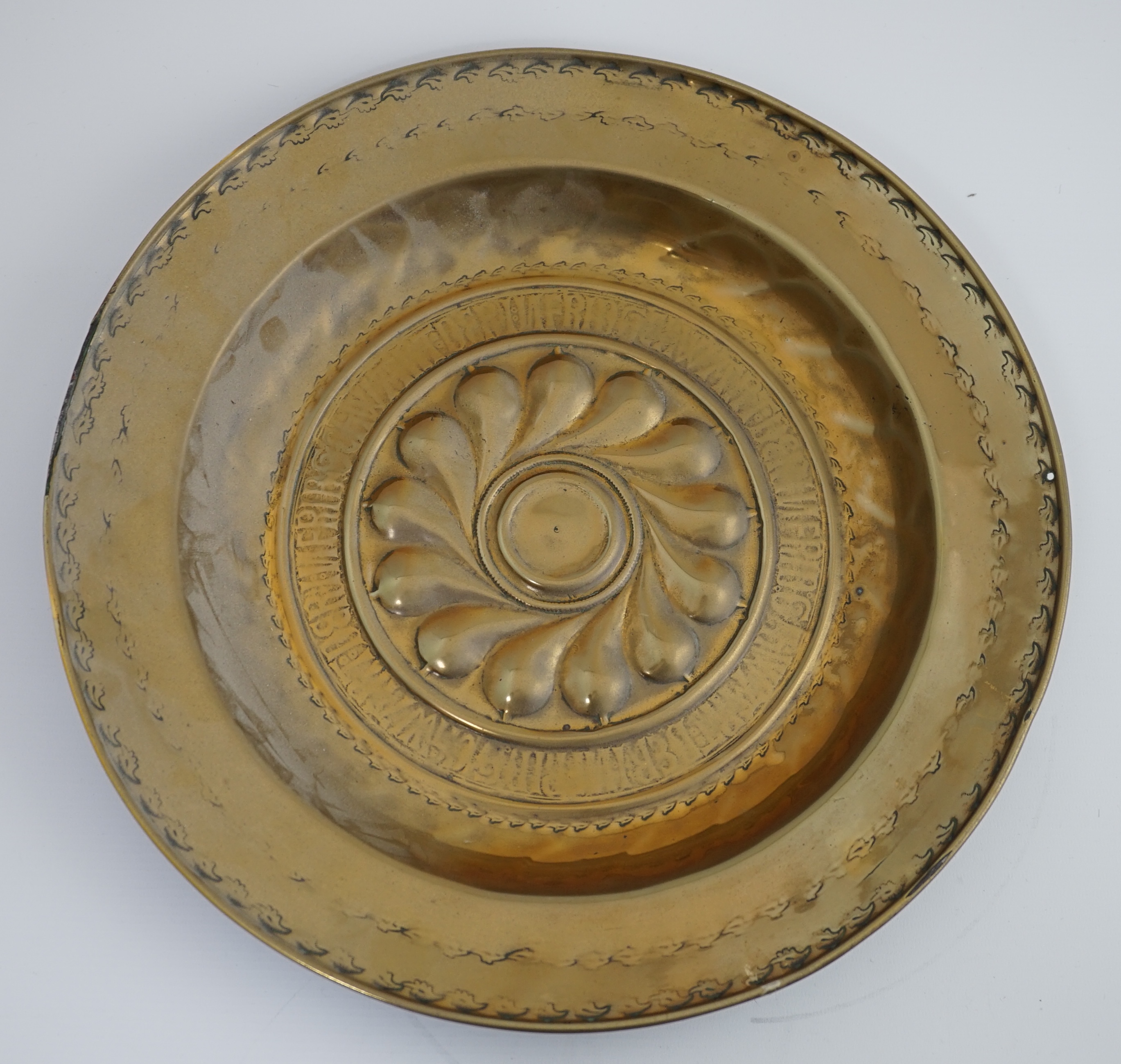 A 16th century German brass alms dish, Nuremberg, circa 1550